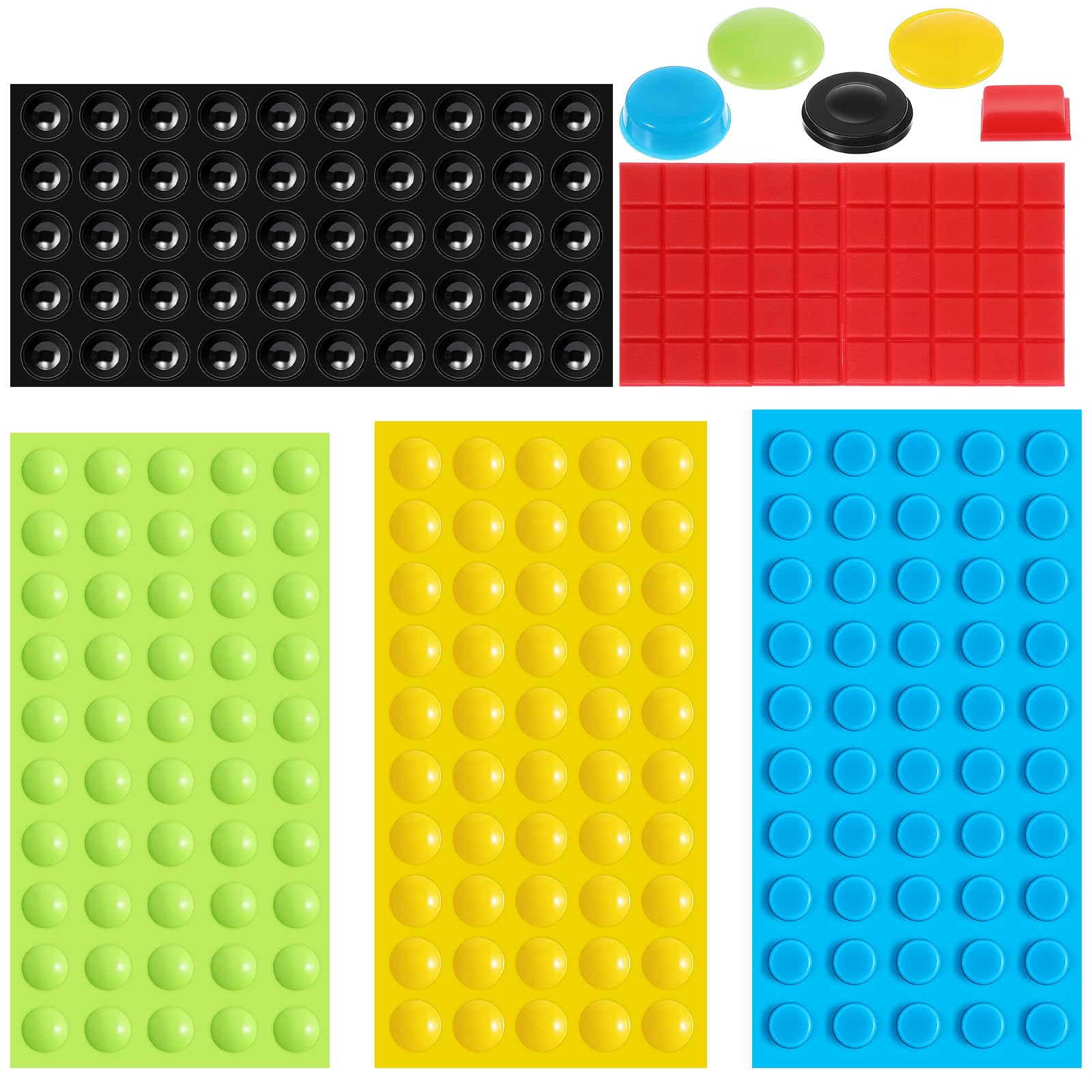 Sheets of raised adhesive tactile dots in several colors and shapes: a black sheet of round dome dots, a red sheet of square dots, and green, yellow, and blue sheets of round dots, with a few loose larger markers — a blue dome, a black ring marker, and green and yellow flat ovals — laid out above the sheets.